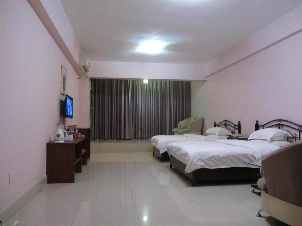 Taohuayuan Apartment Hotel Nanning Bagian luar foto